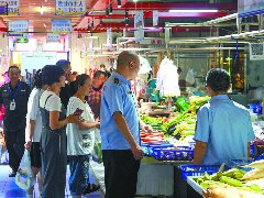 市场展新颜幸福满“菜篮”