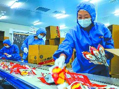 优化生产工艺 西充“小米锅巴”产销两旺